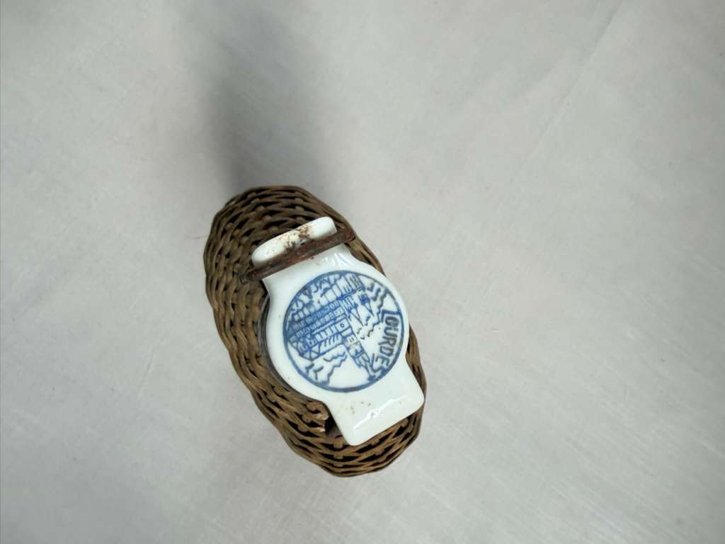 Vintage Lourdes Rattan Wrapped Bottle with Ceramic Swing Top Stopper - Collector & Curator