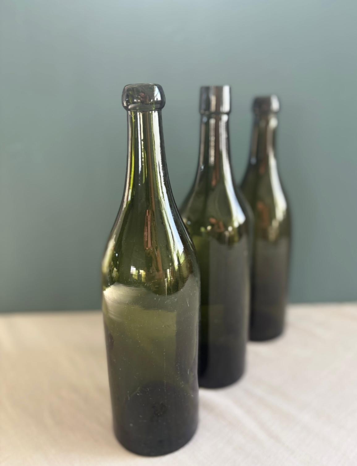 Vintage French Wicker Picnic Basket, Silver Plated Meat Fork, & Three glass wine bottles