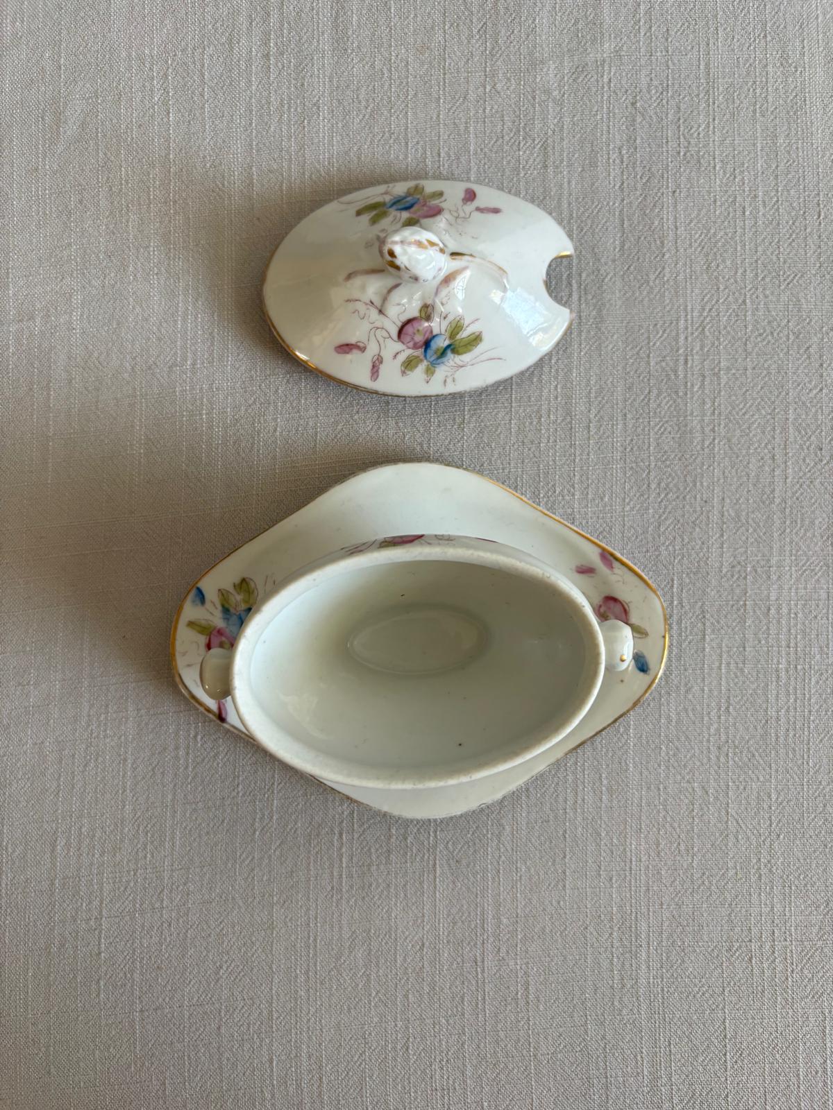 Pair of Vintage French Porcelain Covered Condiment Dishes with Underplates