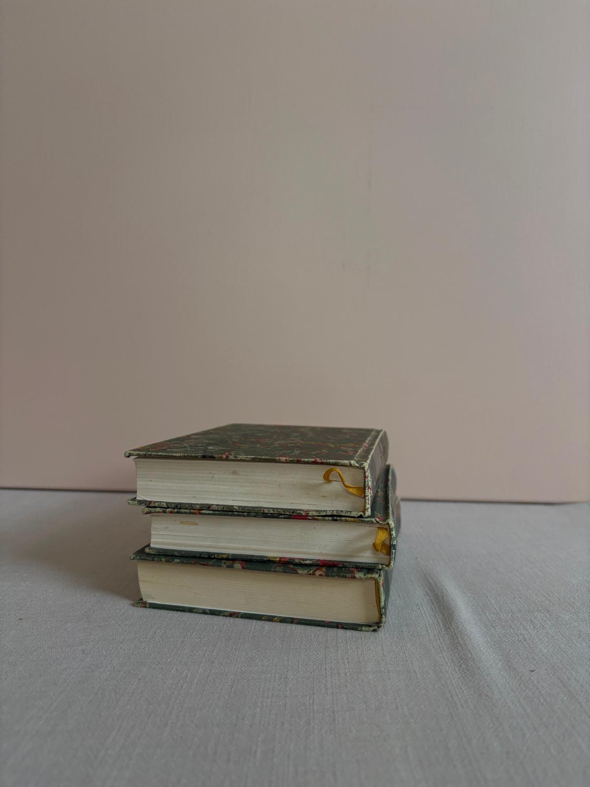 Three vintage marbled books